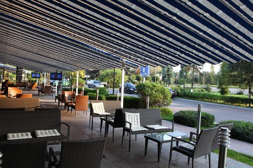 Summer terrace in a restaurant at the Uzhgorod hotel in Uzhgorod. Discounted Stay