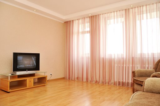 Living room of two-room apartments at the Wellcom24 complex in Kiev. Book rooms for the promotion.